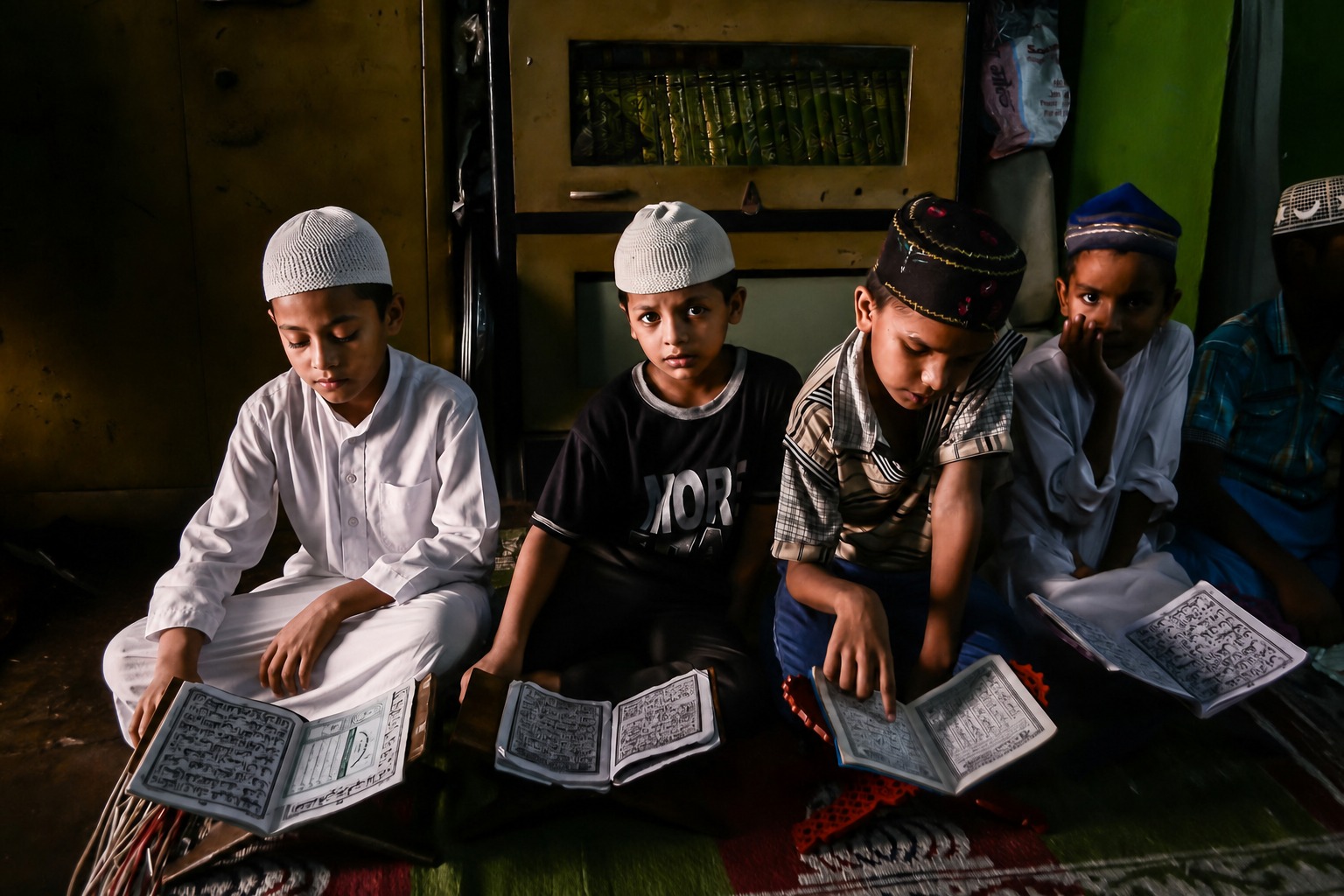 Students reading Quran inside a mosque